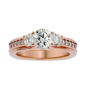 round cut railed hidden channel pinpoint-set diamond three stone engagement ring with 18k rose gold metal and round shape diamond