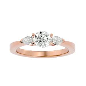 round cut shared claw pear side stones tapered plain band three stone engagement ring with 18k rose gold metal and round shape diamond