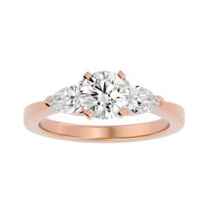 round cut pear side stones tapered plain band three stone engagement ring with 18k rose gold metal and round shape diamond