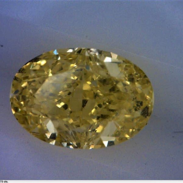 0.73 ct. Yellow Color SI1 Clarity  Cut Oval Diamond 1